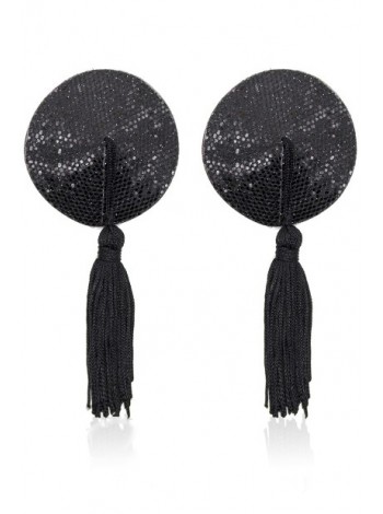 Round black peasts on breasts with tassels