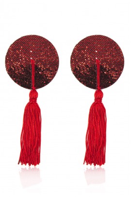 Round red peasts on breasts with tassels