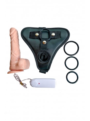 Strapon with a vibrator and a rotating head